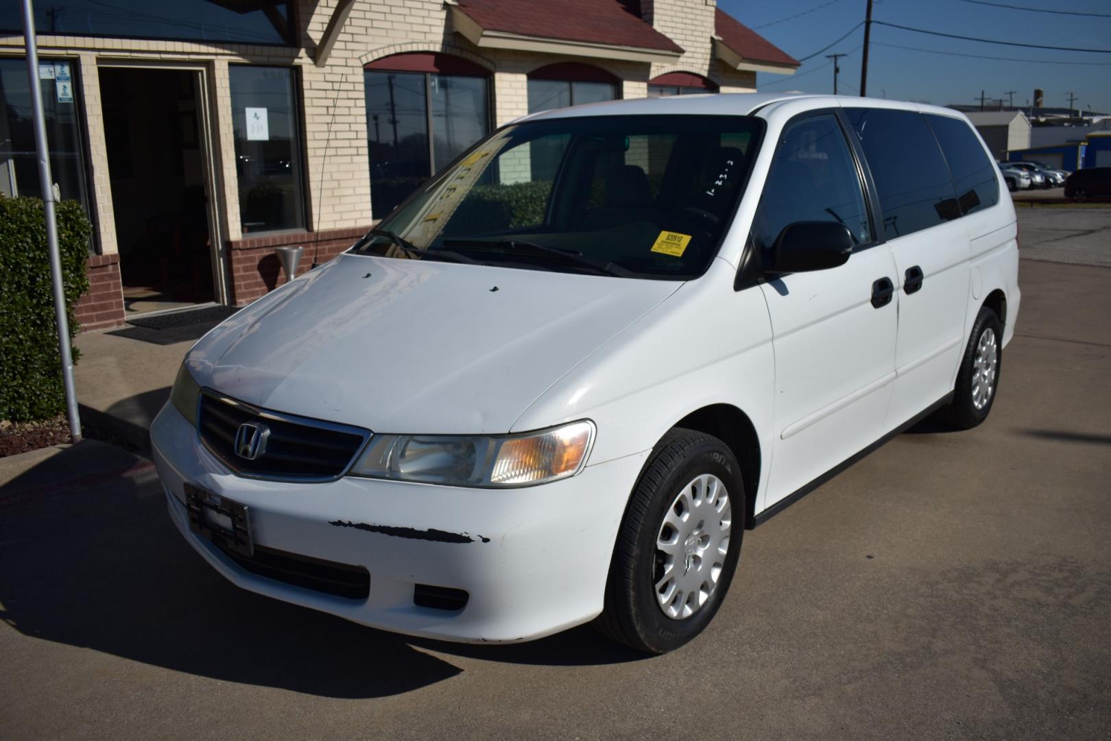 2003 White /Gray Honda Odyssey (5FNRL18513B) , located at 5925 E. BELKNAP ST., HALTOM CITY, TX, 76117, (817) 834-4222, 32.803799, -97.259003 - Buying a 2003 Honda Odyssey can be a smart choice for several reasons: Reliability: Hondas are known for their reliability, and the Odyssey is no exception. The 2003 model year is often praised for its durability and long-lasting performance. Safety: The 2003 Honda Odyssey comes equipped with safe - Photo#1
